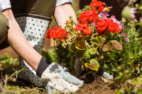Technician checking garden equipment during a safety inspection